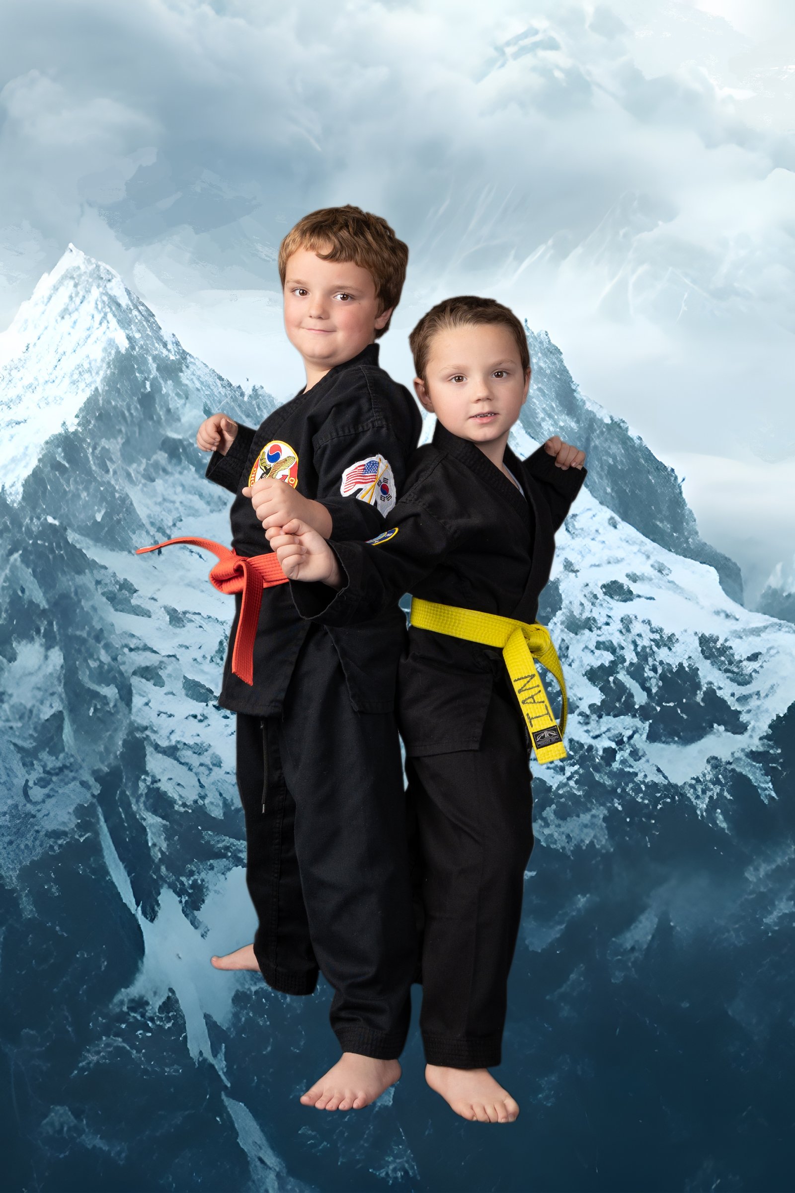 Two young students against a snowy mountain backdrop